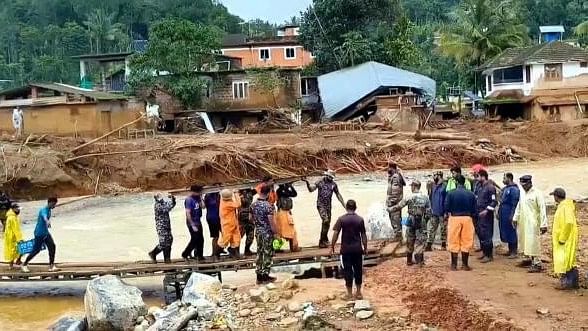 <div class="paragraphs"><p>Indian Navy personnel carry out rescue operation at one of the landslide-hit areas, in Wayanad district, Saturday.&nbsp;</p></div>