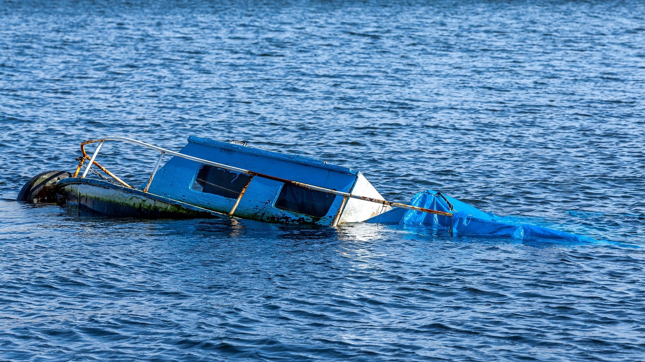 <div class="paragraphs"><p>Representative image showing a capsized boat</p></div>