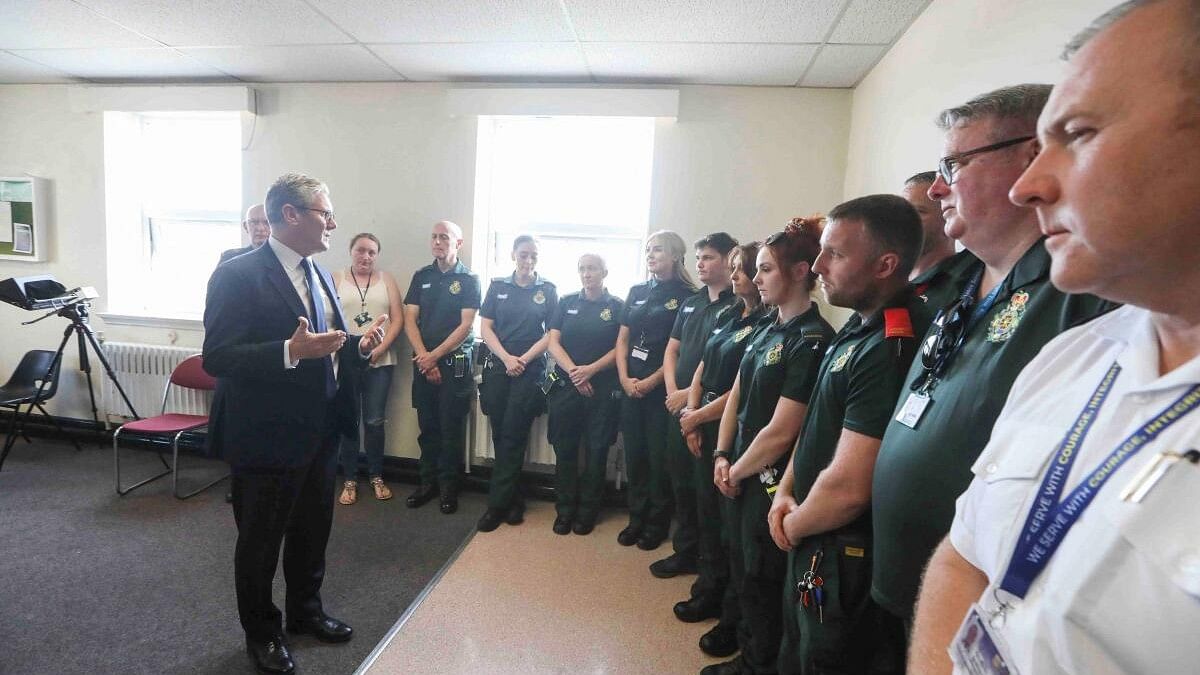 <div class="paragraphs"><p>British Prime Minister Keir Starmer speaks to emergency personnel following a knife attack in which children were killed, in Southport, Britain, July 30, 2024.</p></div>