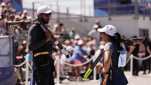 <div class="paragraphs"><p>Paris 2024 Olympics - Shooting - Skeet Mixed Team Bronze Medal - Chateauroux Shooting Centre, Deols, France - August 5, 2024. Maheshwari Chauhan  and Anant Jeet Singh Naruka of India during match.</p></div>