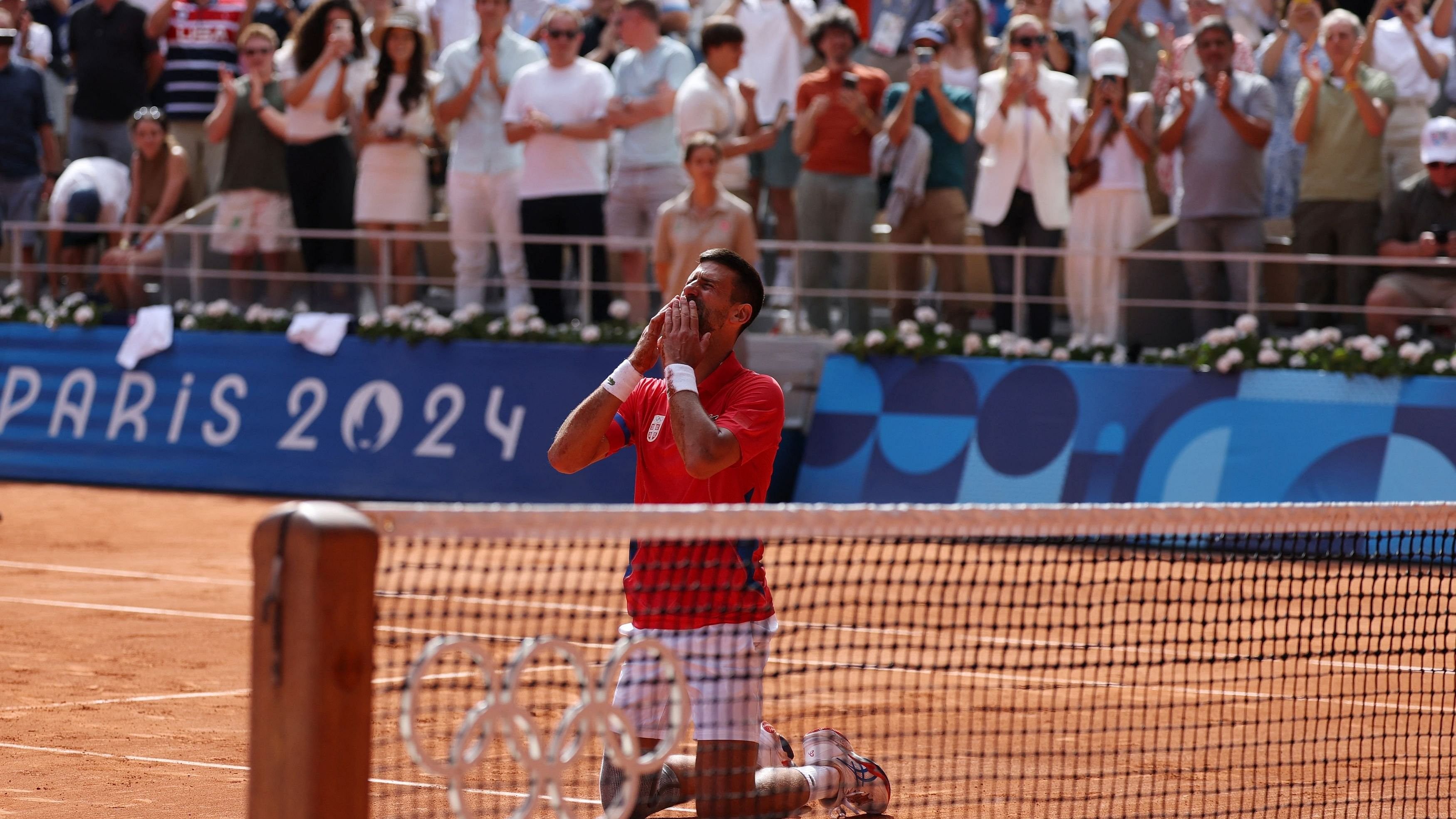 <div class="paragraphs"><p>Novak Djokovic celebrates after winning gold against Carlos Alcaraz of Spain at the Paris Games.</p></div>