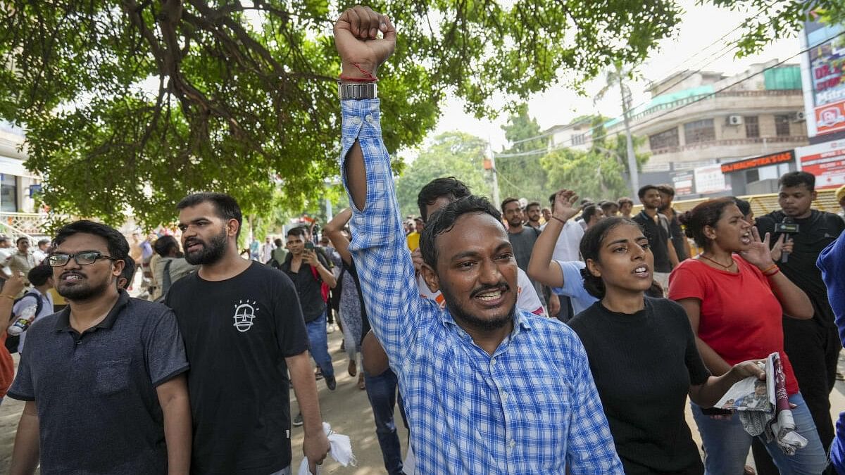 <div class="paragraphs"><p>Students raise slogans during a protest over the deaths of three civil services aspirants due to drowning at a coaching centre in Old Rajinder Nagar area, in New Delhi.&nbsp;</p></div>