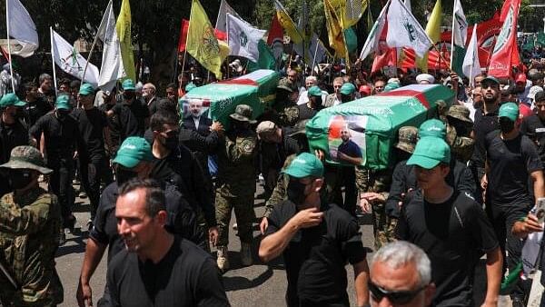 <div class="paragraphs"><p>Demonstrators hold mock coffins during a protest against the killing of Hamas chief Ismail Haniyeh in Iran, in Beirut, Lebanon August 2, 2024.</p></div>