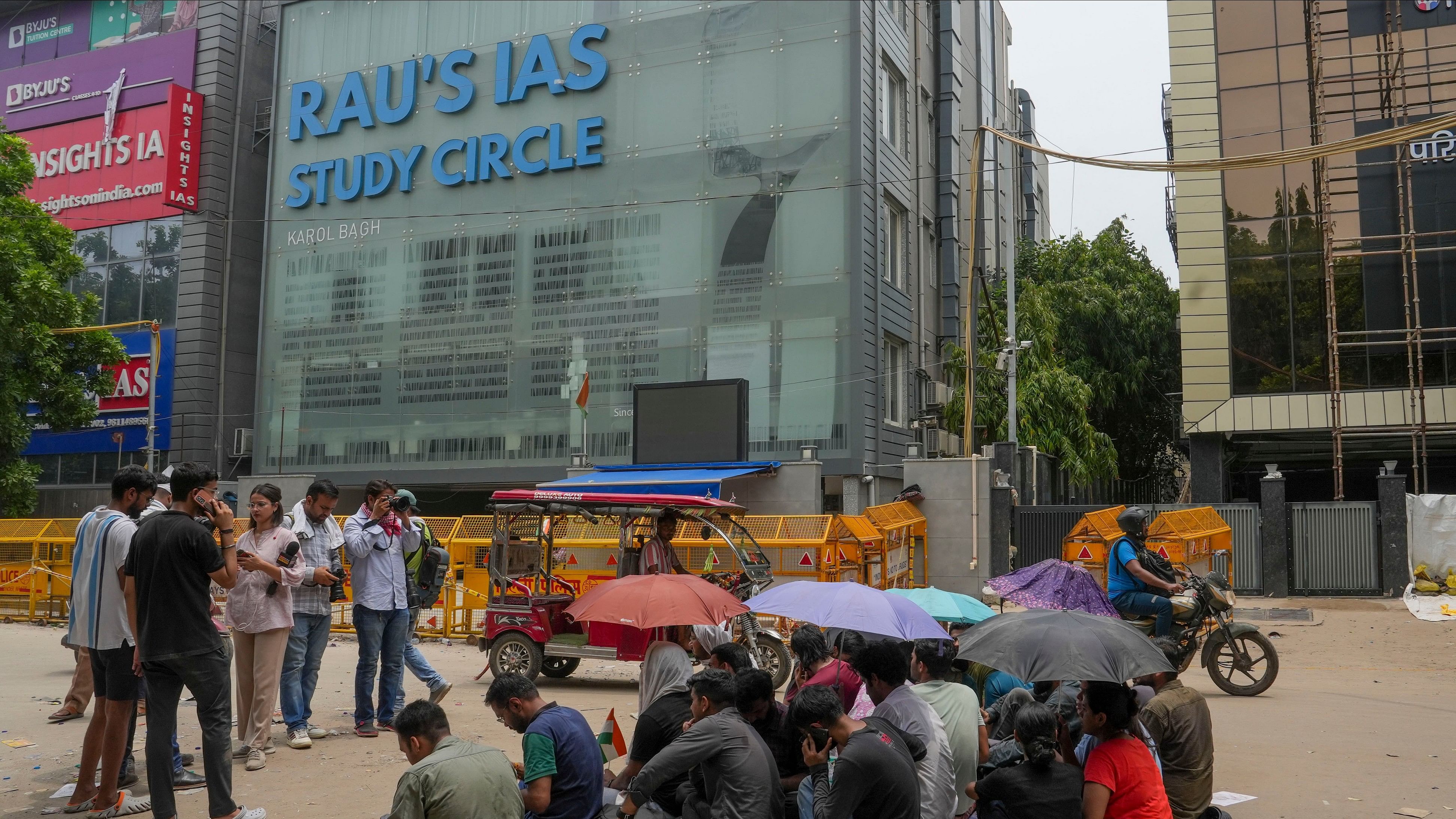 <div class="paragraphs"><p>Students stage a protest after the death of three civil services aspirants at a coaching centre in New Delhi. </p></div>