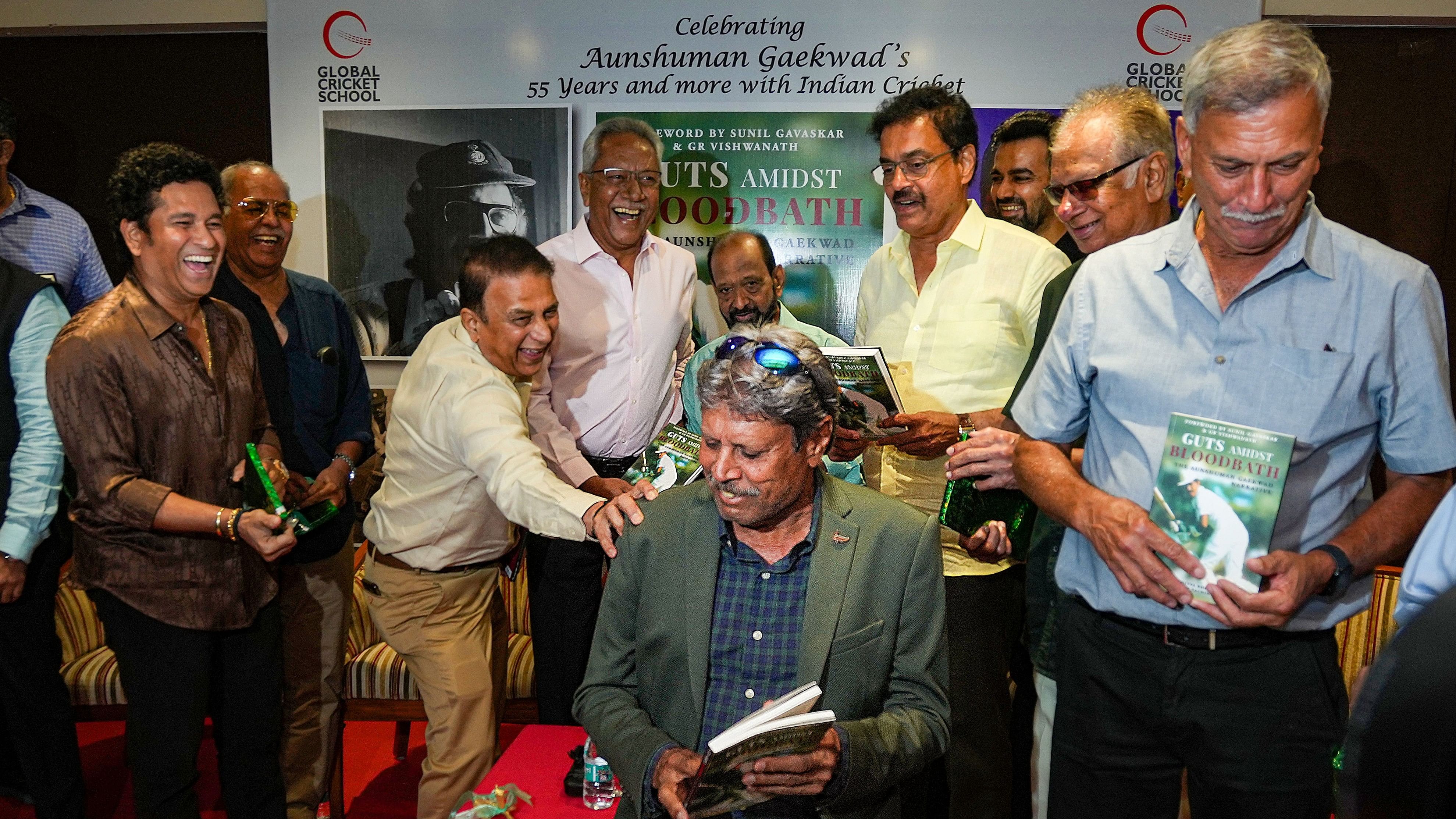 <div class="paragraphs"><p>In this file photo, Anshuman Gaekwad (fourth from left) is flanked by his former team-mates at the launch of his book last year. </p></div>