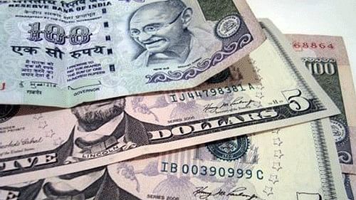 <div class="paragraphs"><p>Indian rupee and US dollar.</p></div>