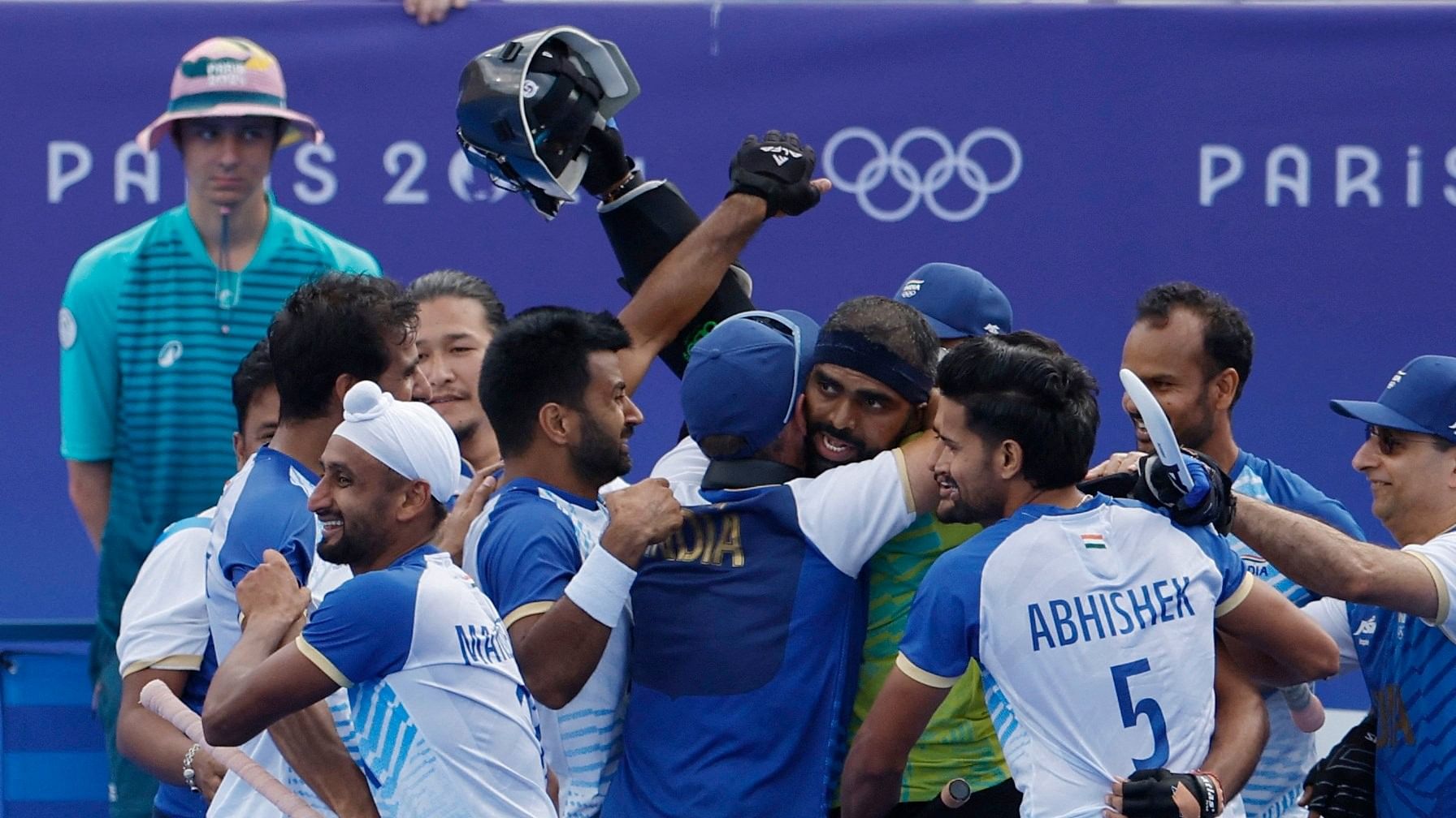 <div class="paragraphs"><p>Mandeep Singh , Abhishek Abhishek and Sreejesh Parattu Raveendran celebrate with teammates winning the match. </p></div>