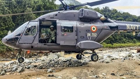 <div class="paragraphs"><p>An Indian Navy helicopter during a rescue operation after a landslide, in Wayanad.</p></div>