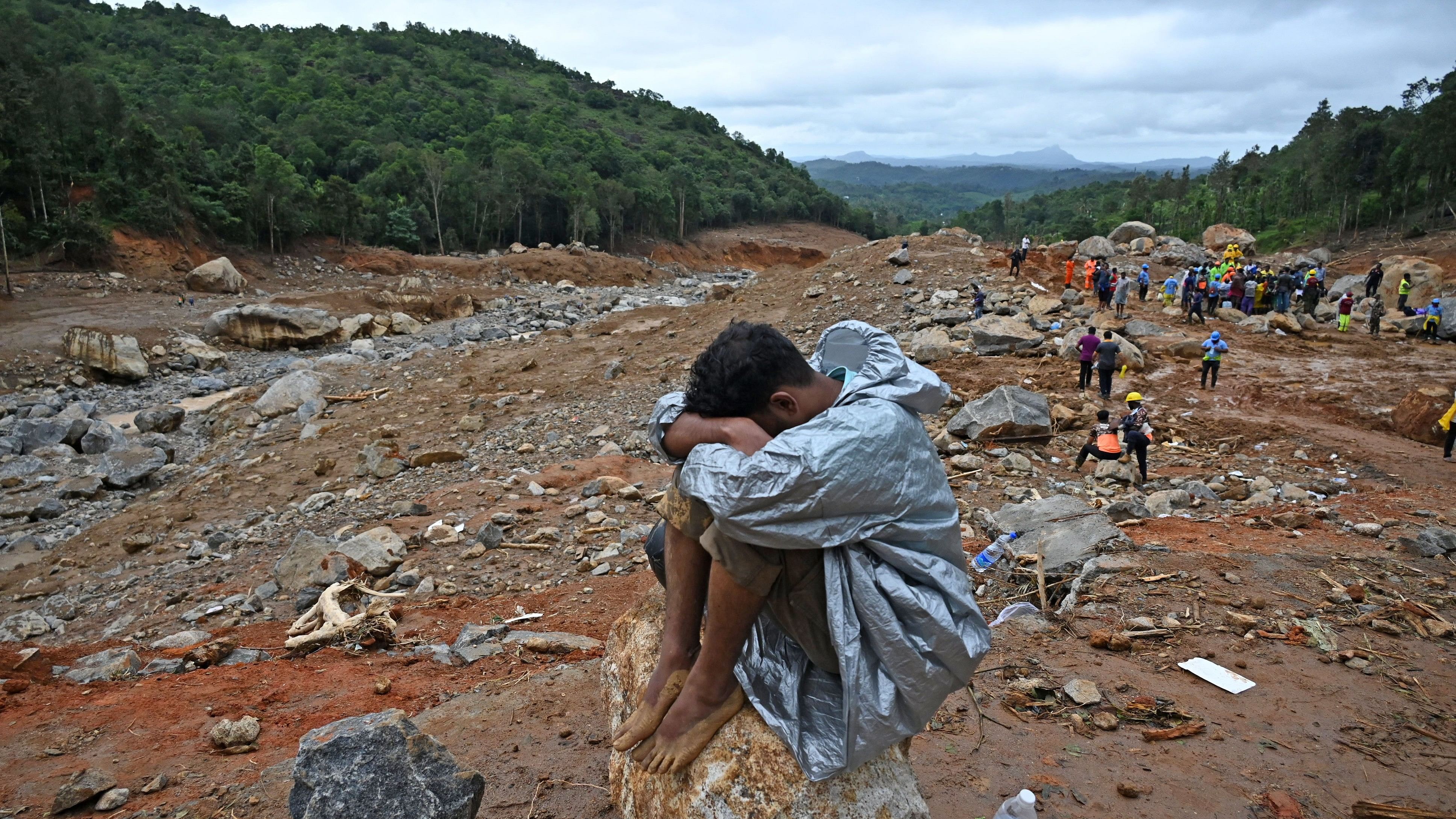 <div class="paragraphs"><p>Ajith a resident of Mundakkai sits on a bolder amid the landslide hit area, where he lost family members, in Wayanad, on Saturday, August 03, 2024.</p></div>