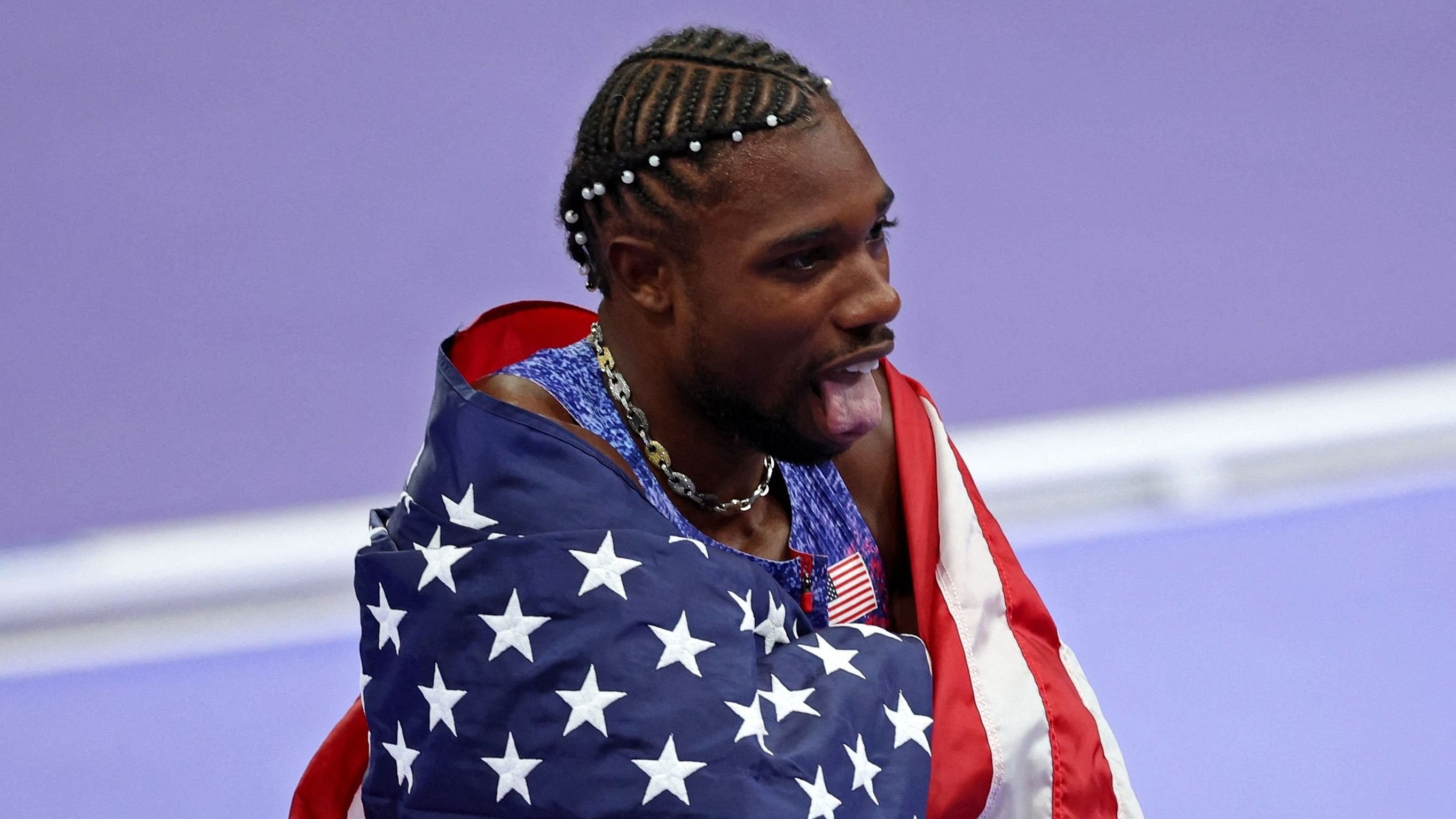 <div class="paragraphs"><p>Noah Lyles of United States celebrates after winning gold. </p></div>