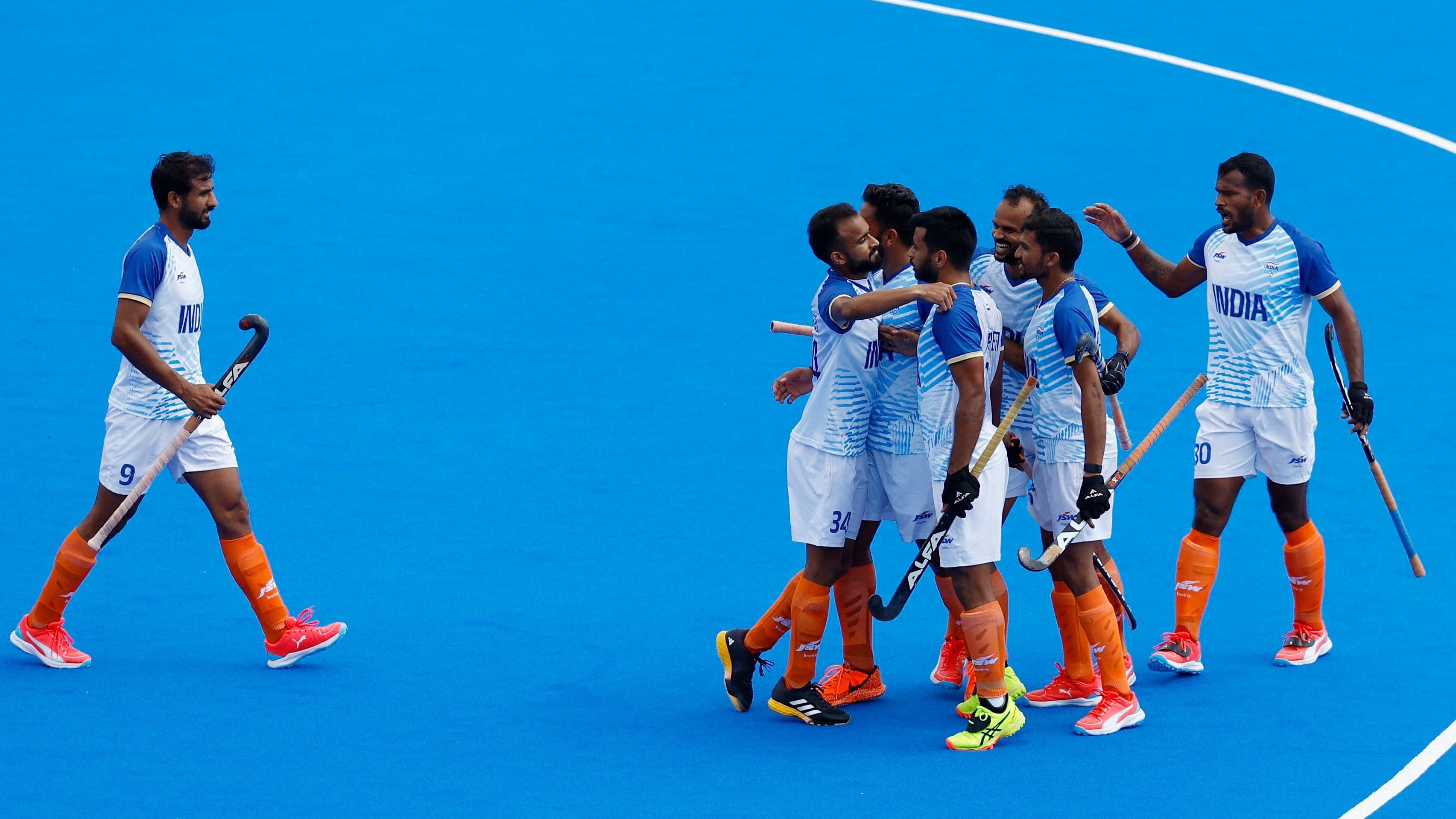 <div class="paragraphs"><p> Gurjant Singh of India, Sukhjeet Singh of India and Amit Rohidas of India celebrate with teammates their second goal in match against Australia.</p></div>