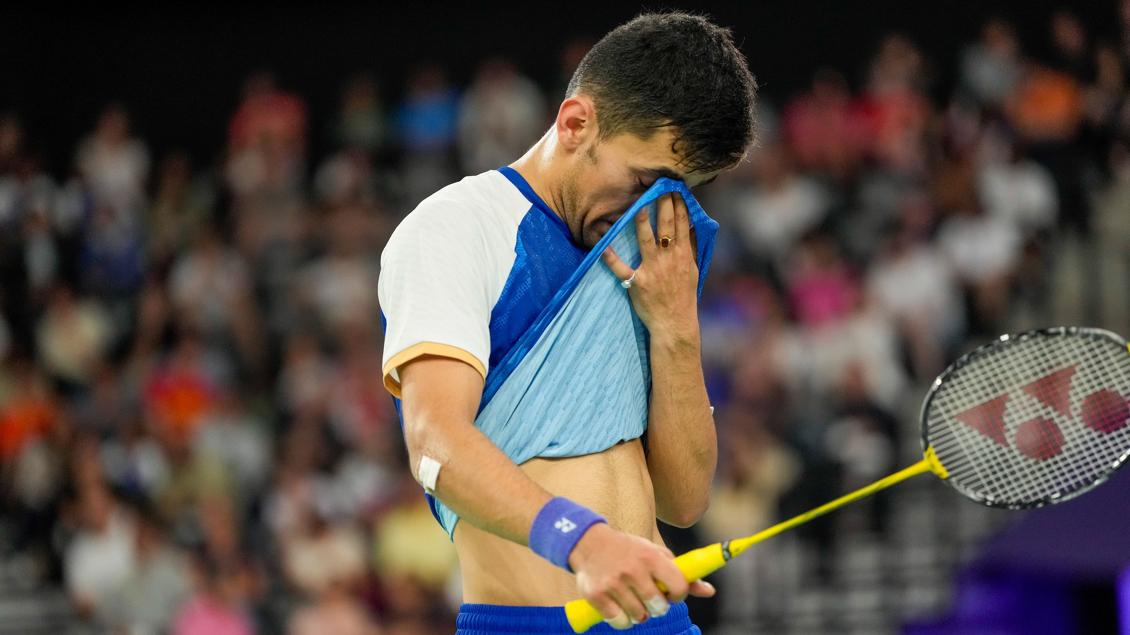 <div class="paragraphs"><p>India’s Lakshya Sen reacts after losing the Men’s Singles Semifinal badminton match against Denmark’s Viktor Axelsen at the 2024 Summer Olympics, in Paris, France, Sunday, Aug 4, 2024.</p></div>