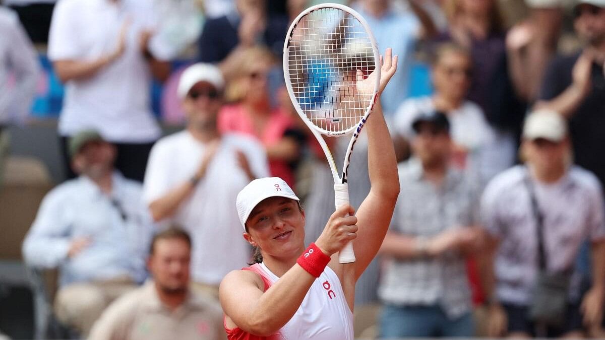 <div class="paragraphs"><p>Iga Swiatek of Poland celebrates after winning her match against Anna Karolina Schmiedlova of Slovakia. </p></div>