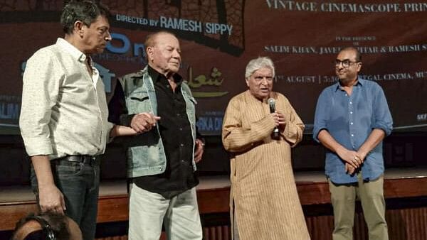 <div class="paragraphs"><p>Screenwriter duo Salim Khan and Javed Akhtar with others during a special screening of film ‘Sholay’, at the Regal Cinema, in Mumbai.</p></div>