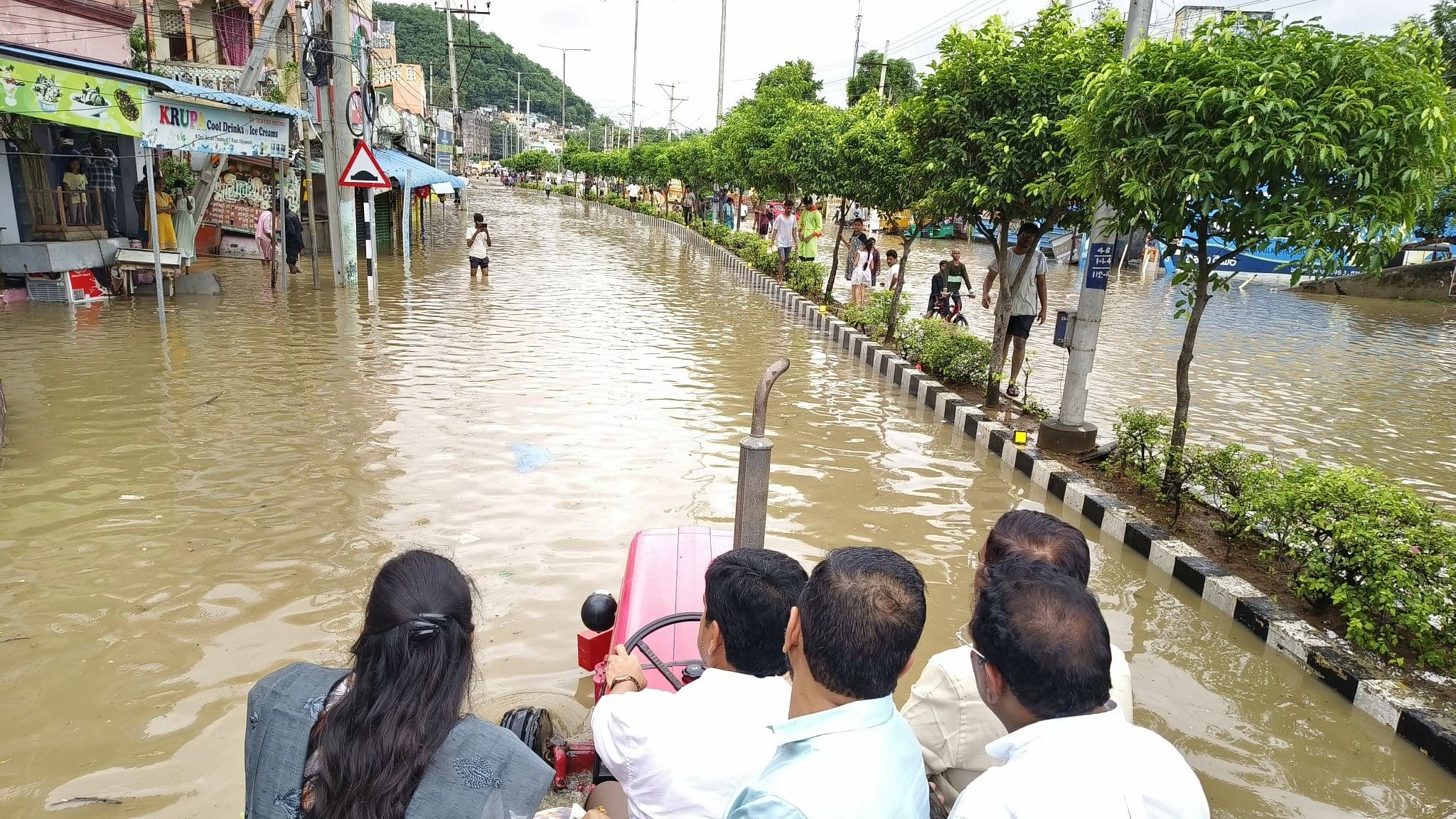 <div class="paragraphs"><p>Home Minister Vangalapudi Anitha touring the flood affected areas in Vijayawada.</p></div>