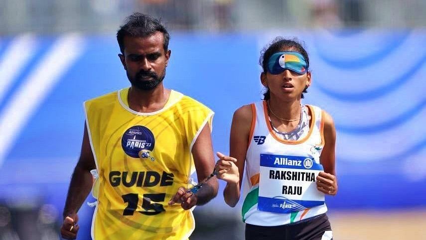 <div class="paragraphs"><p>File photo of guide runner Rahul Balakrishna (left) and visually impaired athlete Rakshita Raju.</p></div>