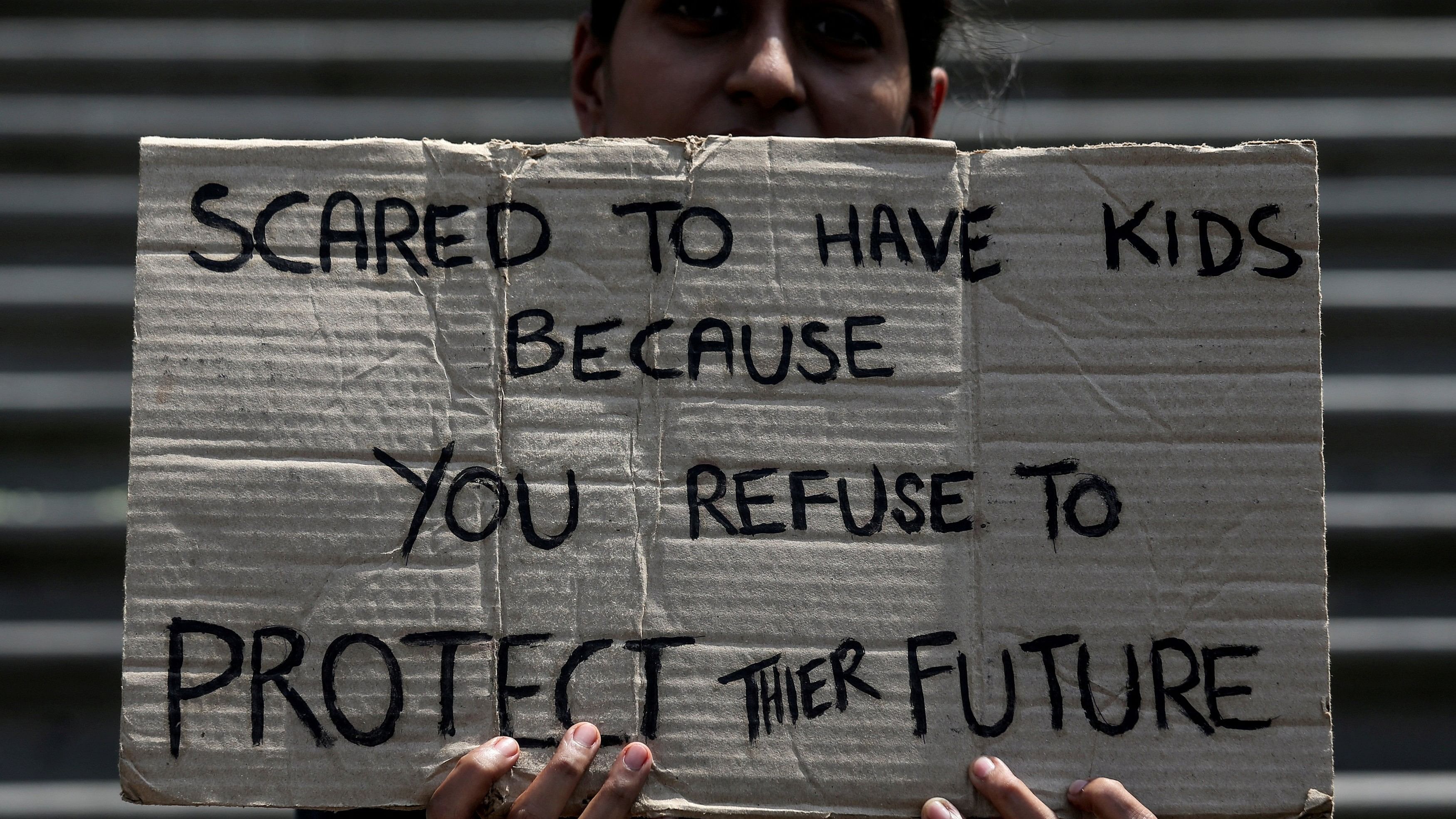 <div class="paragraphs"><p>A student takes part in a global protest against climate change in Mumbai, India, March 15, 2019.</p></div>