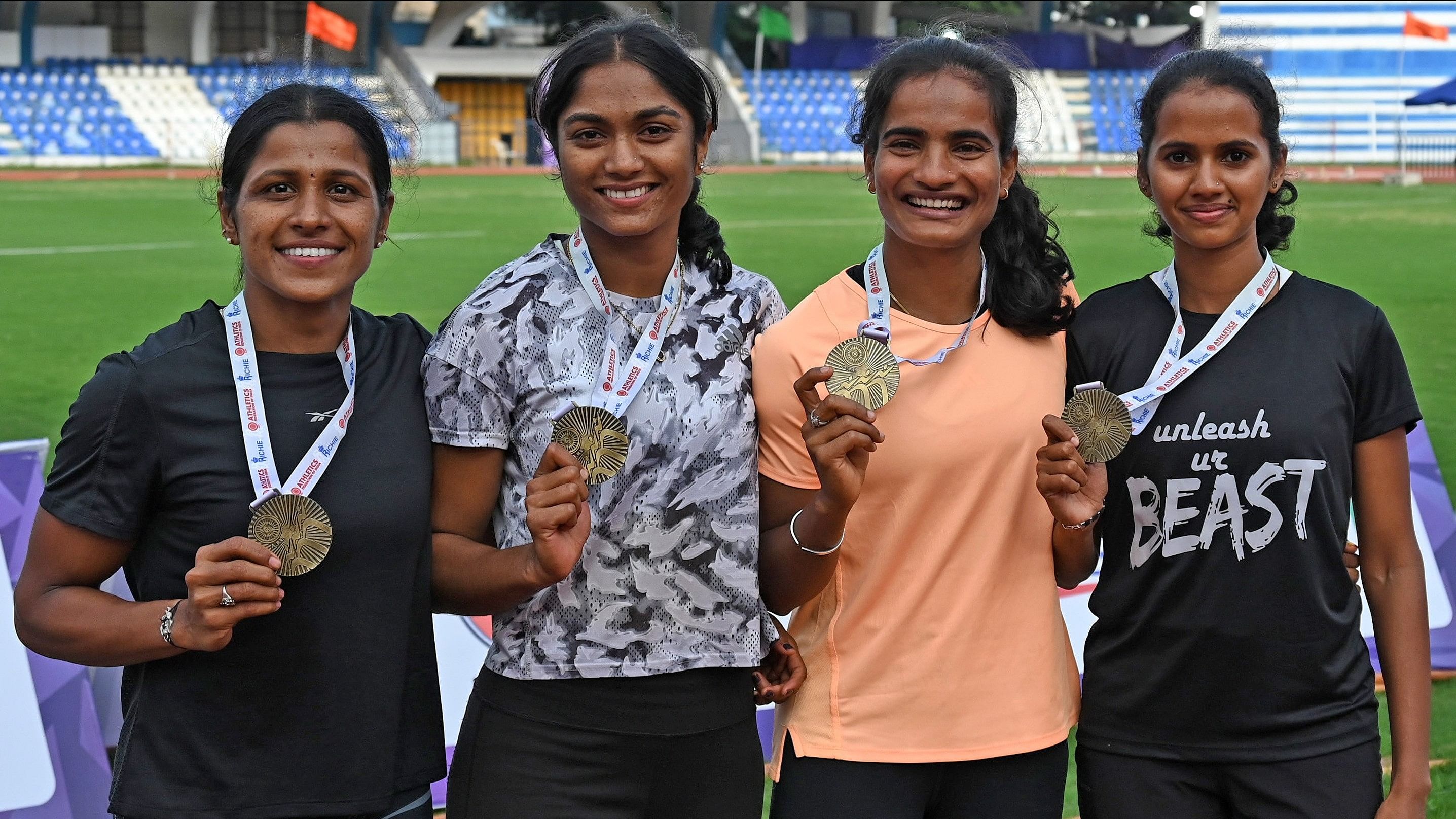 <div class="paragraphs"><p>(From left) Karnataka's Sneha SS, Kaveri Patil, Daneshwari AT and Jyothika pose with their gold medal after winning the 4x100m relay in the 63rd National Open Athletics Championship at the Sree Kanteerava stadium on Sunday. </p></div>