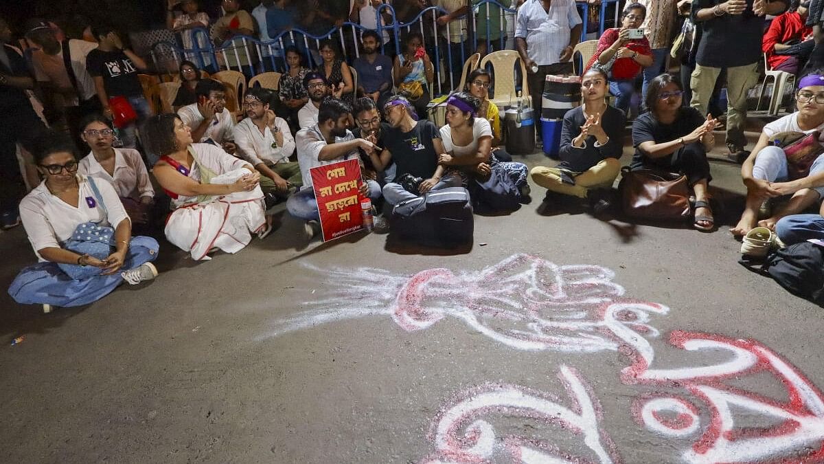 <div class="paragraphs"><p>Actor Swastika Mukherjee with activists during an overnight sit-in dharna after a protest rally demanding justice for a trainee doctor who was raped-murdered at RG Kar Medical College and Hospital, at Kolkata.</p></div>