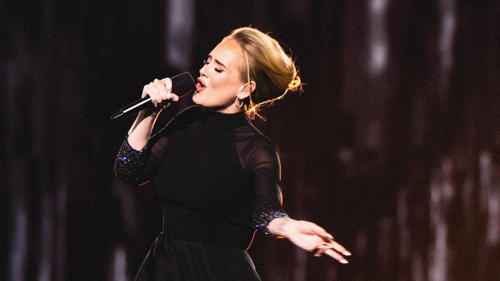 <div class="paragraphs"><p>Adele performing at Munich concert</p></div>