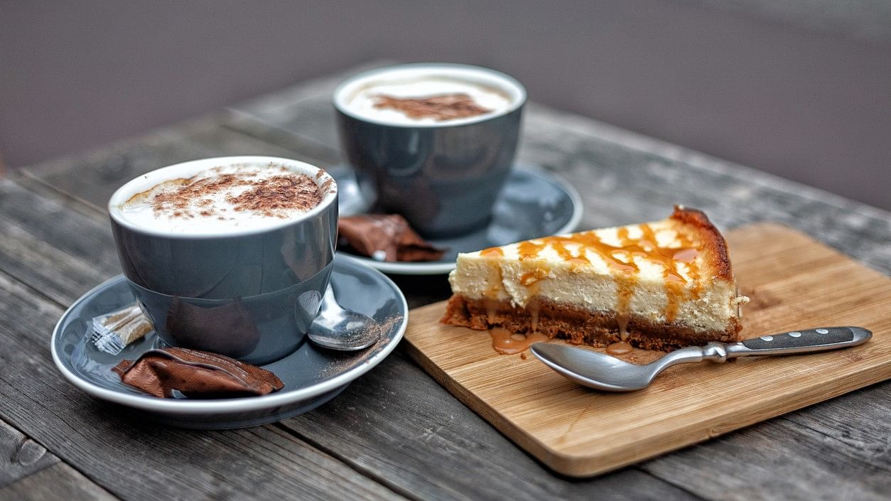 <div class="paragraphs"><p>Image showing cups of coffee and a cake.</p></div>