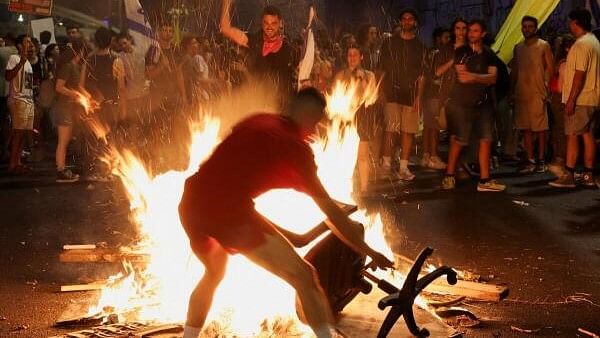 <div class="paragraphs"><p>Protest against the government and in support for the hostages who were kidnapped during the deadly October 7 attack, in Tel Aviv.</p></div>