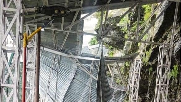 <div class="paragraphs"><p>A collapsed structure on a track to the Vaishno Devi shrine following a landslide, in Reasi district.</p></div>