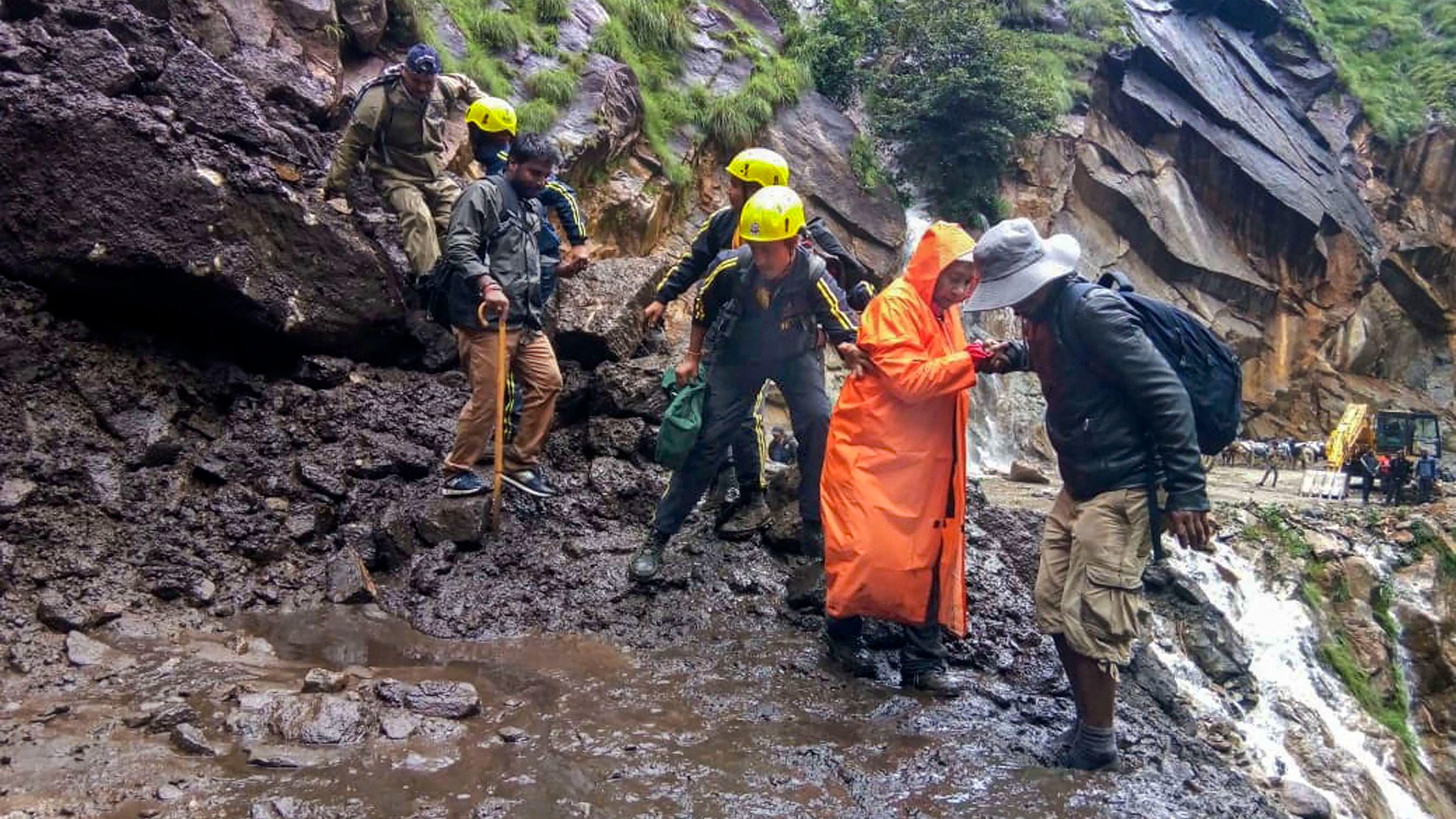 <div class="paragraphs"><p>Image showing pilgrims being aided by SDRF after being stuck in bad weather. For representational purposes.</p></div>