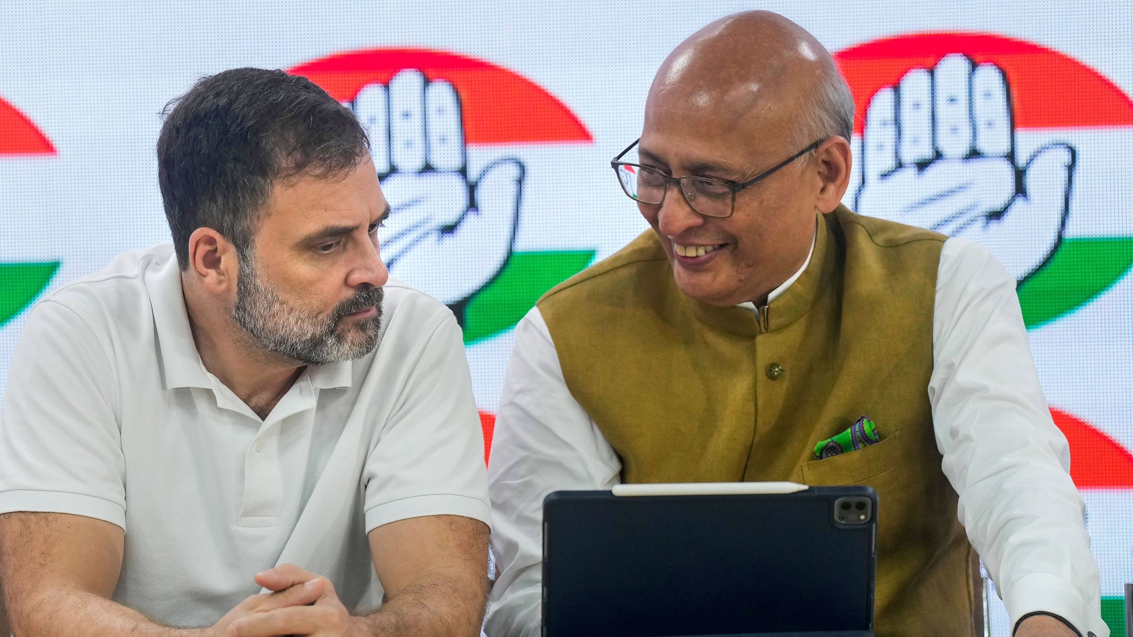 <div class="paragraphs"><p>Congress leader Rahul Gandhi with party leader Abhishek Manu Singhvi </p></div>