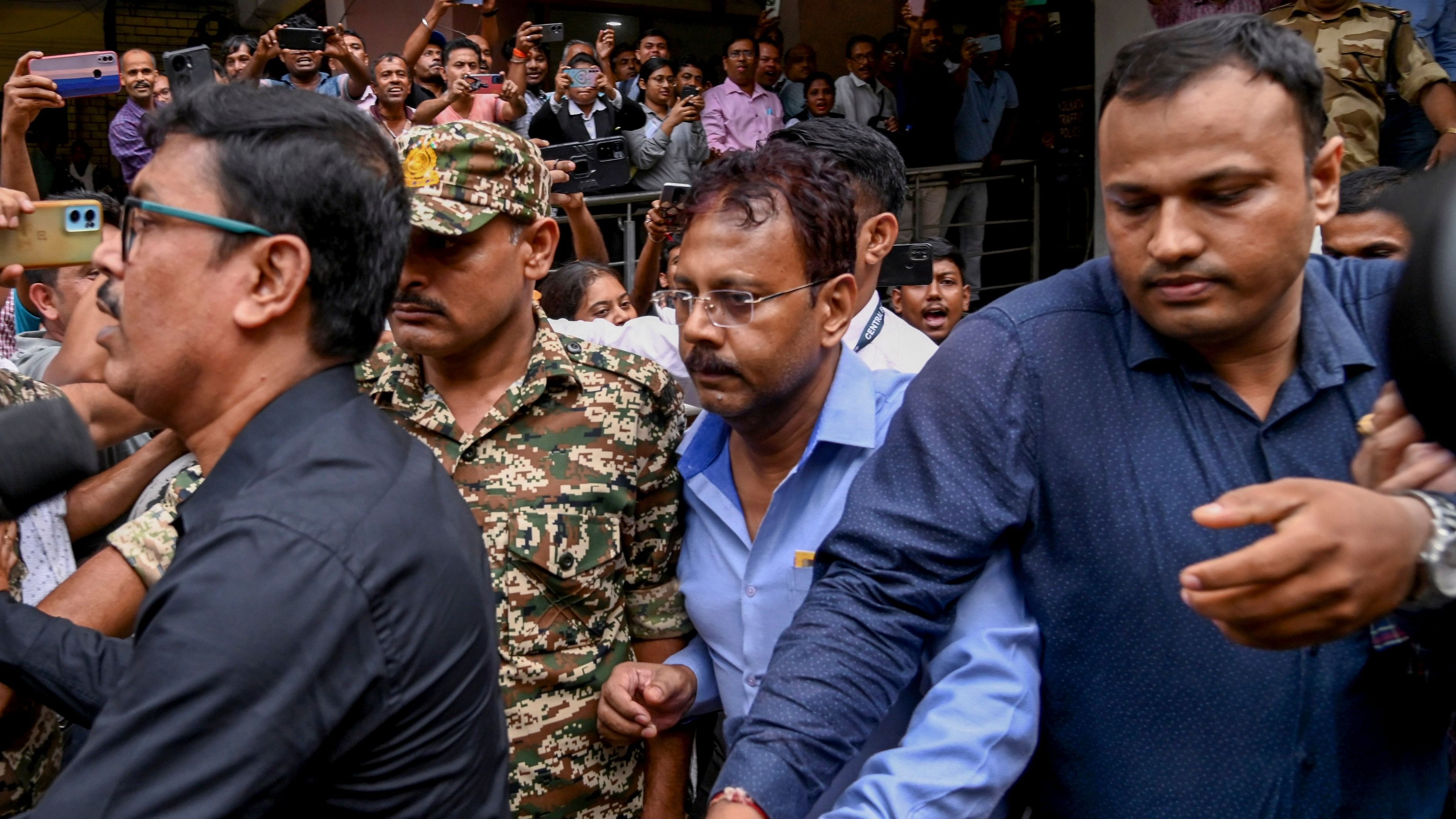 <div class="paragraphs"><p>CBI officials produce the former principal of RG Kar Medical College and Hospital Sandip Ghosh, arrested in connection with the alleged financial misconduct at the establishment, at a city court in Kolkata.&nbsp;</p></div>