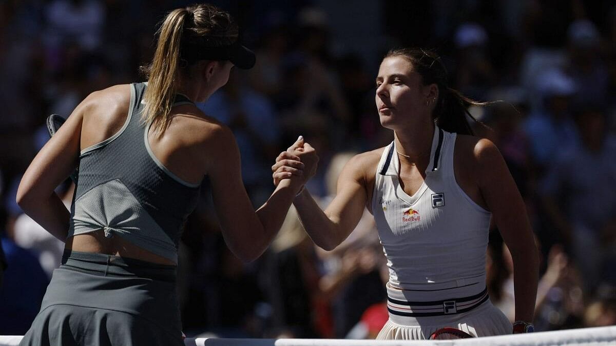 <div class="paragraphs"><p>Emma Navarro of the US shakes hands with Spain's Paula Badosa after winning her quarter final match.</p></div>