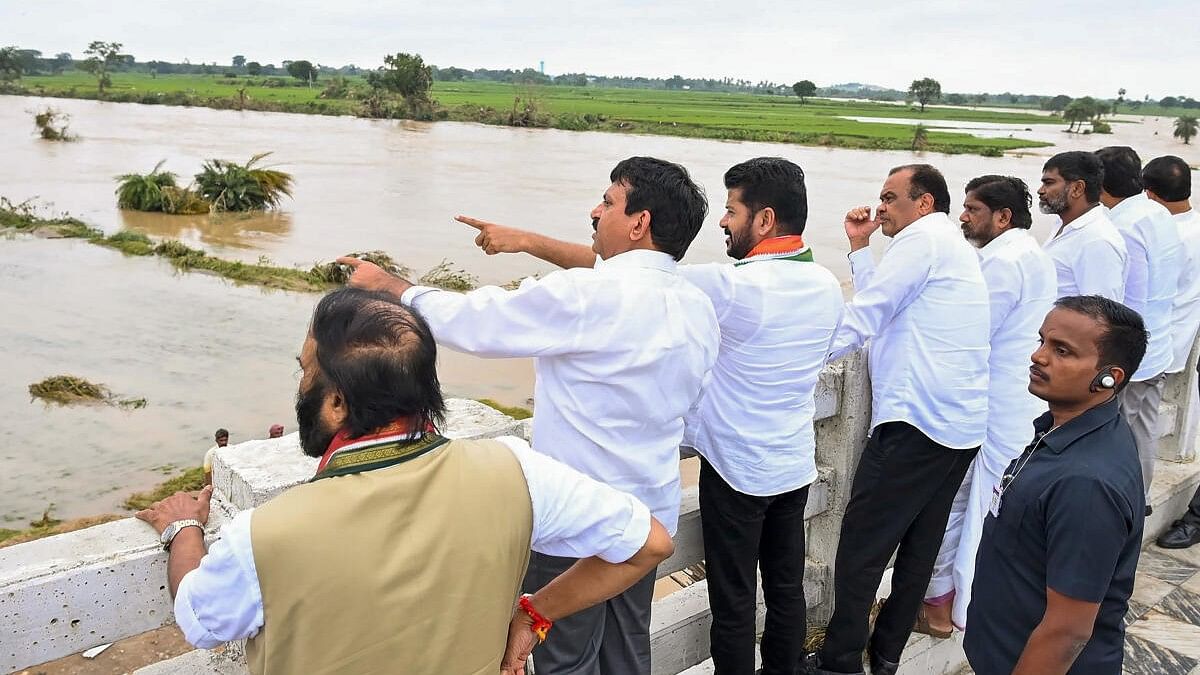 <div class="paragraphs"><p>Telangana CM Revanth Reddy inspects a flooded area, in Khammam, Monday, Sept. 2, 2024.</p></div>