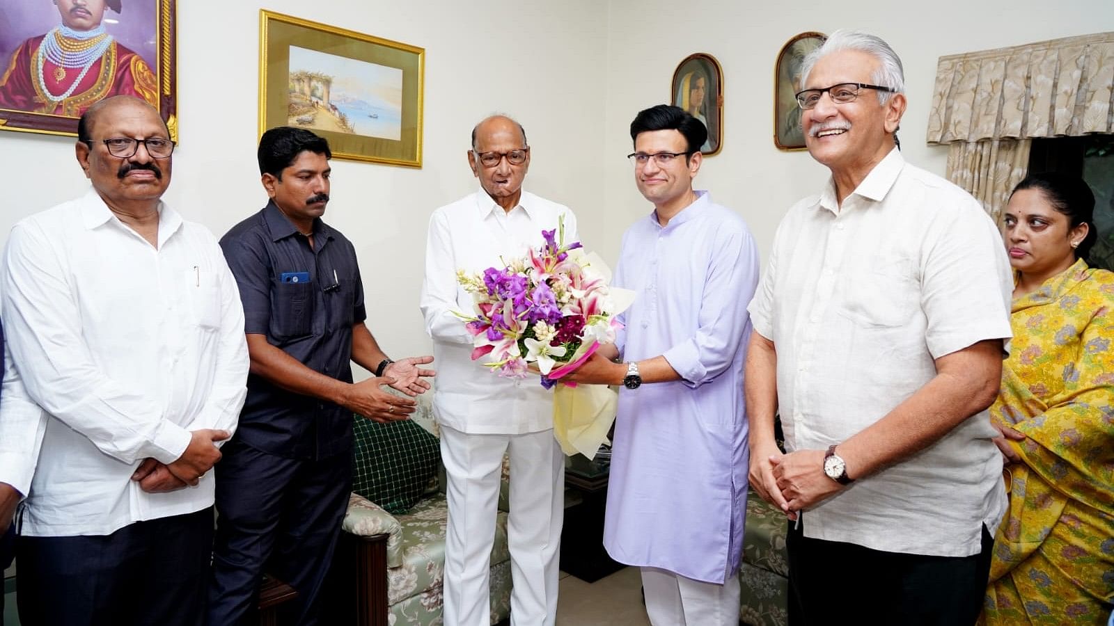 <div class="paragraphs"><p>Raje Samarjeetsinh Ghatge is greeted by Sharad Pawar.&nbsp;</p></div>