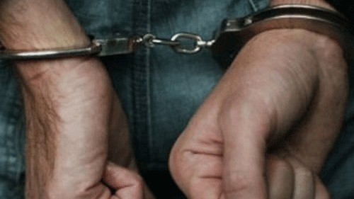 <div class="paragraphs"><p>Representative image showing a person in handcuffs.</p></div>