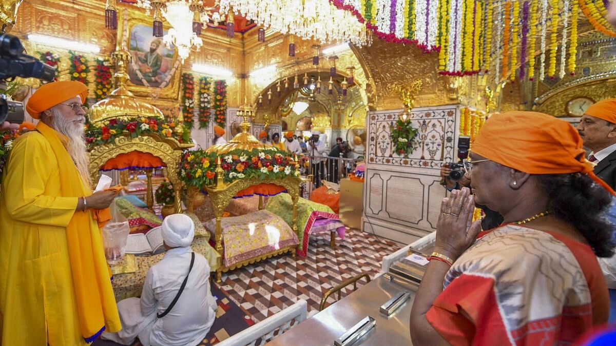 <div class="paragraphs"><p>President Droupadi Murmu offers prayers during a visit to the Takhat Sachkhand Sri Hazur Sahib, in Nanded. </p></div>