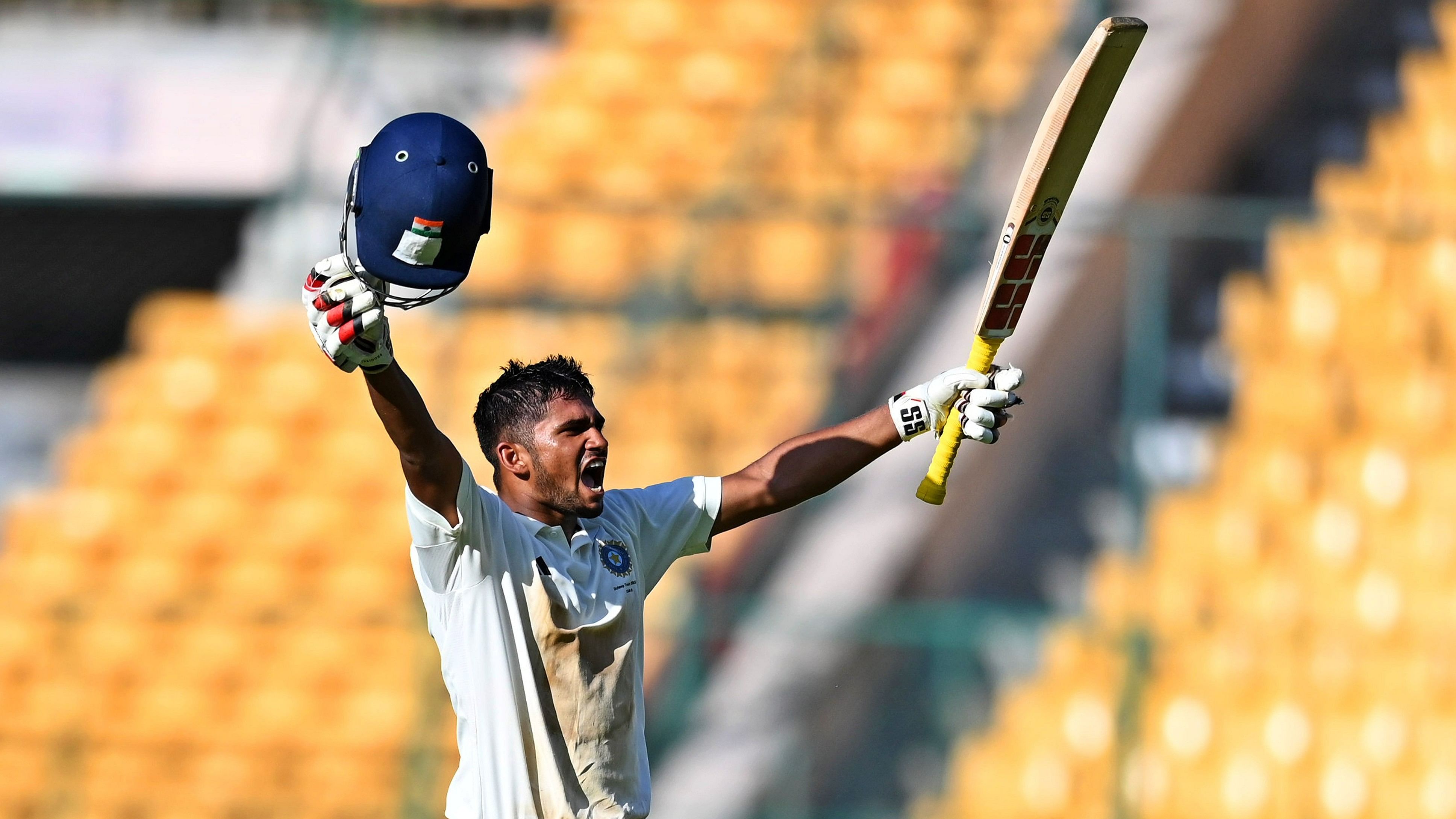 <div class="paragraphs"><p>India B's Musheer Khan celebrates after scoring his century on the opening day of their Duleep Trophy match against India A at the M Chinnaswamy Stadium in Bengaluru on Thursday.</p></div>