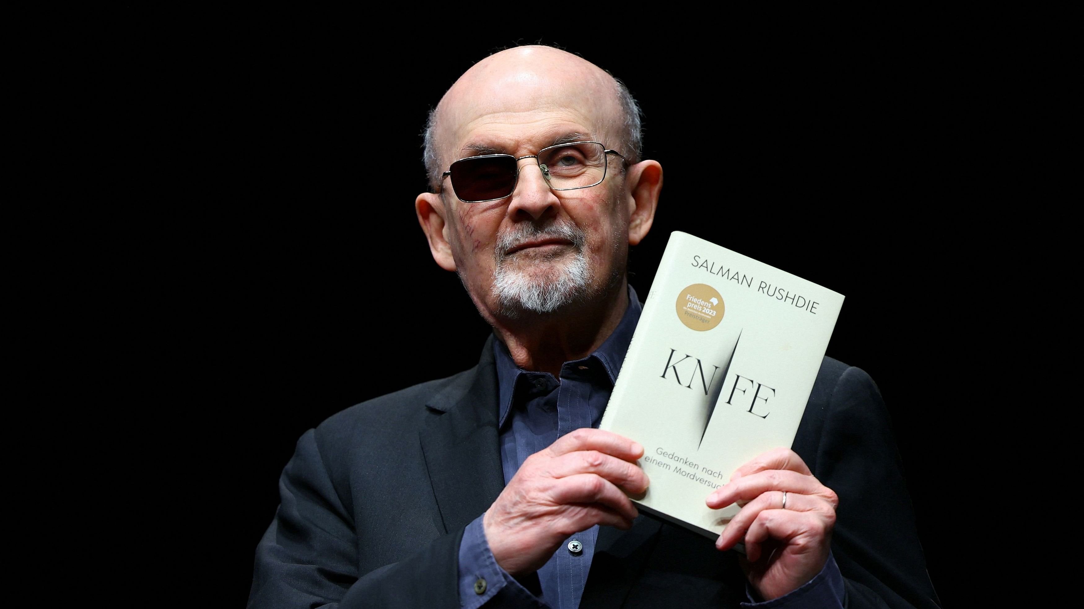 <div class="paragraphs"><p>Author Salman Rushdie with his book 'Knife: Meditations After an Attempted Murder'.&nbsp;</p></div>