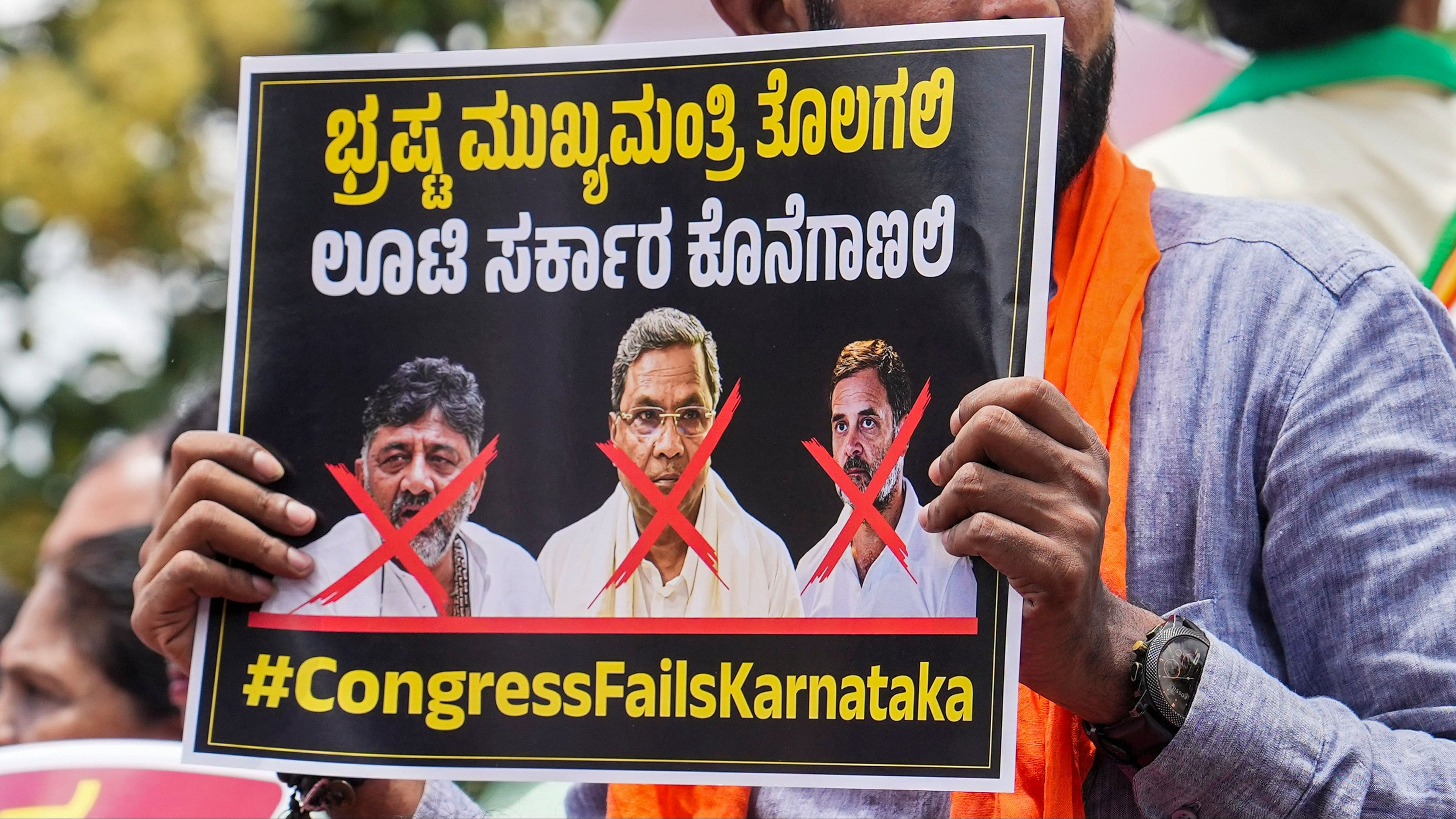 <div class="paragraphs"><p>File Photo: BJP MLAs and MLCs raise slogans during a protest against Karnataka Chief Minister Siddaramaiah over alleged MUDA scam, in Bengaluru, on August 22, 2024. </p></div>