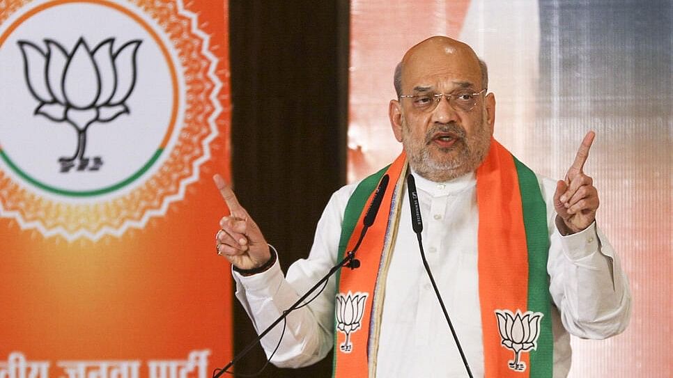 <div class="paragraphs"><p>Union Home Minister Amit Shah addresses the gathering during the release of BJP's election manifesto ahead of the state Assembly elections, in Jammu</p></div>