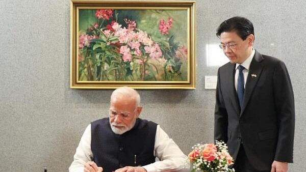 <div class="paragraphs"><p>Prime Minister Narendra Modi with his Singapore counterpart Lawrence Wong</p></div>