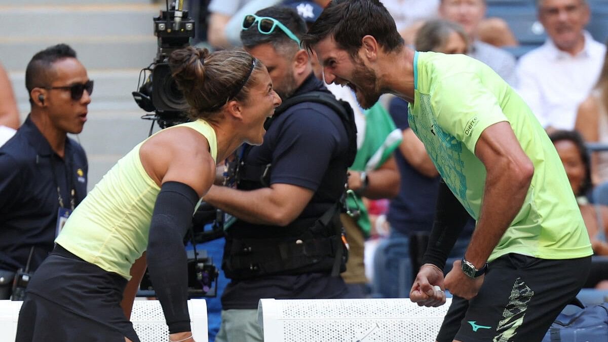 <div class="paragraphs"><p>Italy's Sara Errani and Andrea Vavassori celebrate after winning their mixed doubles final against Taylor Townsend and Donald Young of the US.</p></div>