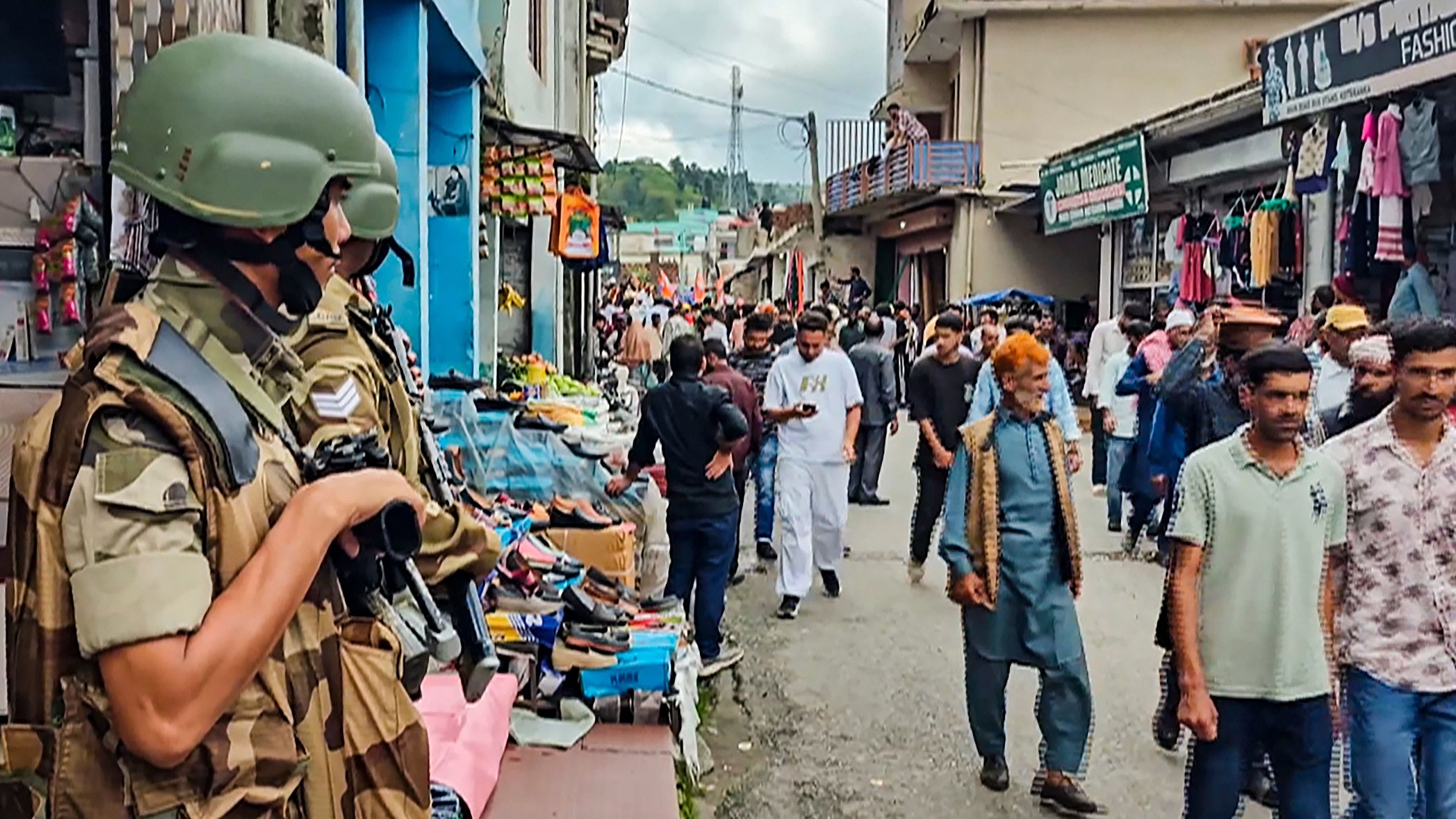 <div class="paragraphs"><p>Security personnel keep vigil after security was enhanced ahead of the Jammu and Kashmir Assembly elections.</p></div>