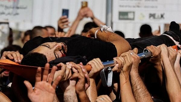 <div class="paragraphs"><p>Mourners carry the body of a Palestinian, during the funeral for four militants, who were killed in an Israeli airstrike, in Tubas, in the Israeli-occupied West Bank, September 5, 2024.</p></div>