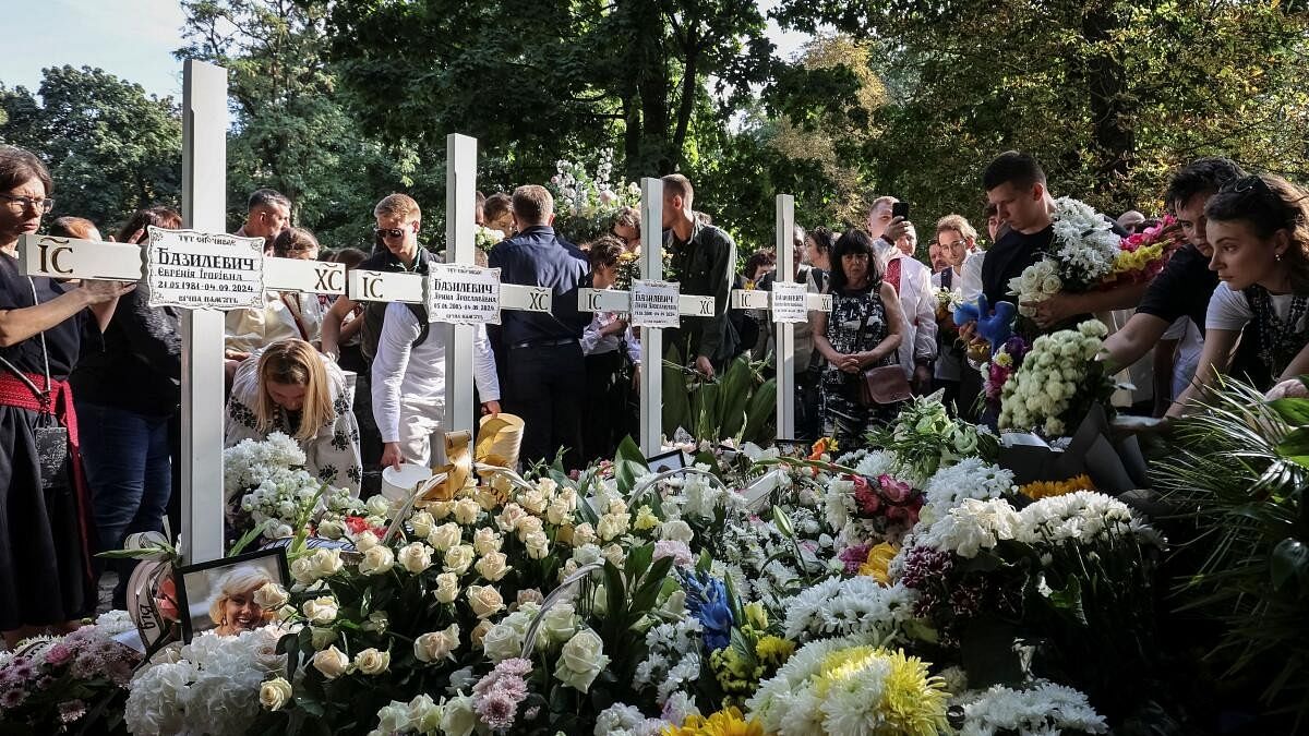 <div class="paragraphs"><p>Funeral of Ukrainian Yevhenia Bazylevych and her three daughters, killed during the Russian missile attack, in Lviv.</p></div>