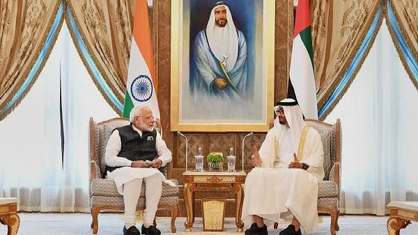 <div class="paragraphs"><p>Prime Minister Narendra Modi with Crown Prince of the Emirate of Abu Dhabi and Deputy Supreme Commander of the United Arab Emirates Armed Forces Sheikh Mohammed bin Zayed Al Nahyan. File Photo</p></div>