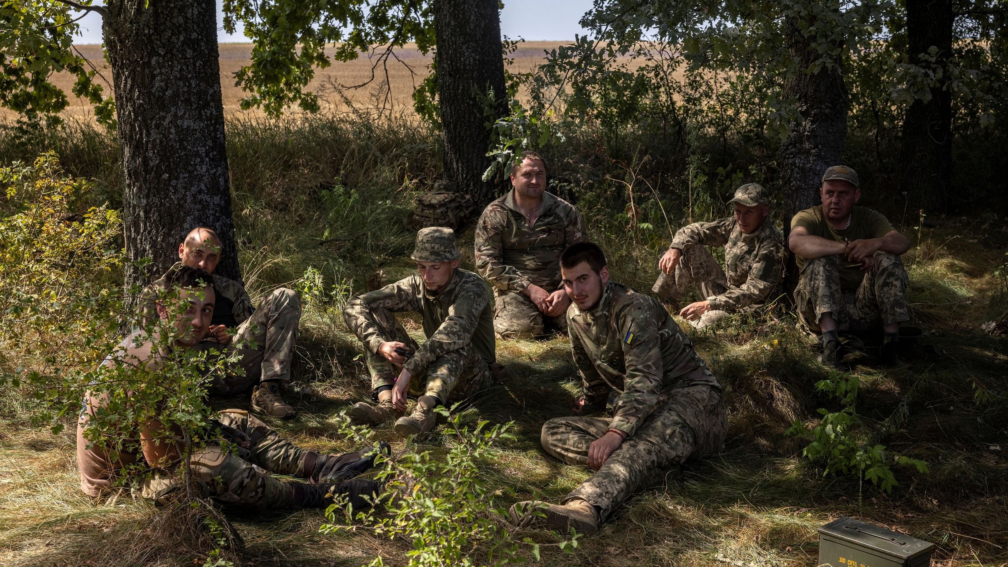 <div class="paragraphs"><p>Soldiers of Ukraine's 22nd Separate Mechanised Brigade rest  amid Russia's attack on Ukraine.</p></div>