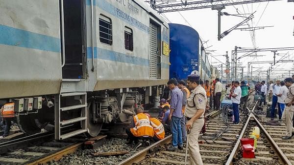 <div class="paragraphs"><p>Railway team gathers after two coaches of the Somnath express derailed, in Jabalpur, Saturday.&nbsp;</p></div>