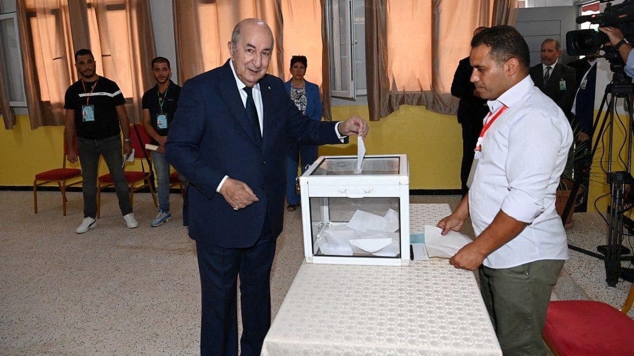 <div class="paragraphs"><p>Algerian President and presidential candidate Abdelmadjid Tebboune casts his vote at a polling station during the presidential election in Algiers, Algeria September 7, 2024.</p></div>