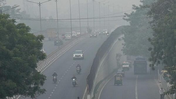 <div class="paragraphs"><p>Vehicles move on a road amid smog in New Delhi. (Image for representation)</p></div>