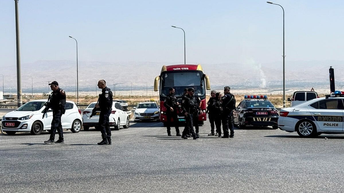 <div class="paragraphs"><p>Israeli police patrol the area near Allenby Bridge Crossing between the West Bank and Jordan following a shooting incident in the crossing in the Israeli-occupied West Bank.</p></div>